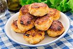 Delicious cutlets made of fish on a plate