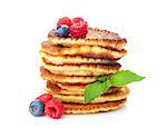 Pancakes with raspberry, blueberry and mint. Isolated on white background
