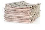Closeup of stack of newspapers