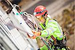 Industrial climber on a building