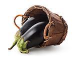 Eggplants in a basket isolated on white