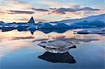 Winter sunset over Jokulsarlon, a glacial lagoon at the head of the Breidamerkurjokull Glacier on the edge of the Vatnajokull National Park, South Iceland, Iceland, Polar Regions