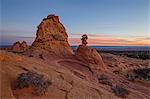 Sandstone formations at dawn with pink clouds, Coyote Buttes Wilderness, Vermilion Cliffs National Monument, Arizona, United States of America, North America