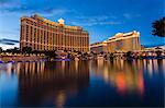 Bellagio and Caesars Palace reflections at dusk, The Strip, Las Vegas, Nevada, United States of America, North America