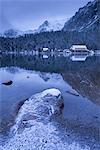 Popradske Pleso lake and mountain cottage in wintertime, Slovakia, Europe