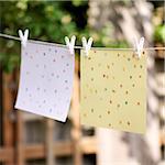 Children's Artwork Hung up on Clothesline in Summer