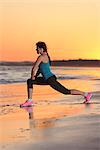 Woman exercising at beach