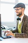 Mid adult man working in office