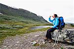 Female hiker drinking water