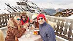 Friends enjoying drinks together