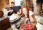 Couple exchanging gifts on Christmas