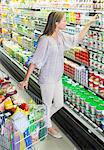 Woman shopping in grocery store