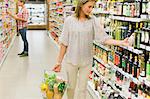 Woman shopping in grocery store