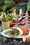 Christmas table setting with decorative mitten.