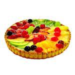Beautiful and delicious fruit cake with strawberries, pineapple, apples, cherries, plums, kiwi, grapes and peaches.