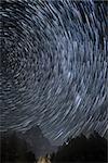 Star trails over the Mount Cervino in an autumn night, Aosta Valley