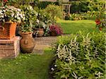 View of private garden and patio of a home in summer, Toronto, Ontario, Canada