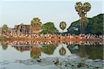 Tourists looking at sunrise, Angkor Wat Temple complex, UNESCO World Heritage Site, Angkor, Siem Reap, Cambodia, Indochina, Southeast Asia, Asia