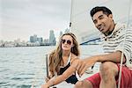 Young couple on sailing boat
