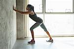 Woman stretching at home