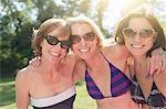 Portrait of three mature women in swimwear