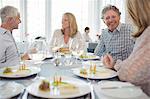 People enjoying fancy meal in restaurant