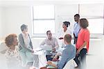 Group of business people having meeting in modern office