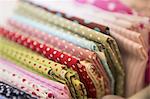 Selection of colourful sewing fabrics.