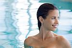 Woman relaxing in swimming pool