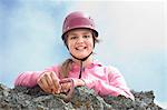Climber girl young mountains holding carabiner