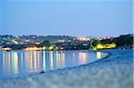 City Lights Reflected in Lago di Garda at Blue Hour in Autumn, Italy