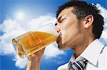 Japanese businessman drinking draft beer