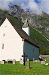 Old Eidfjord Church and mountains, white stone church built in 1309, Eidfjord, Hordaland, Hardanger, Norway, Scandinavia, Europe