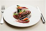 Roe deer fillet with vegetables, purple potato puree and red wine sauce