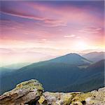 Red majestic Sunrise over the mountains  with big stones, Carpathians, Europe