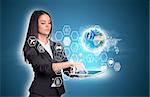 Beautiful businesswomen in suit using digital tablet. Earth and transparent hexagons with icons. Element of this image furnished by NASA