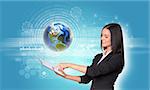 Beautiful businesswomen in suit using digital tablet. Earth with figures, network and rectangles. Element of this image furnished by NASA