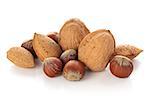 Mix of nuts: Walnuts, Huselnuts and Almonds. Isolated on white.