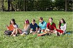 Laughing group of male and female students outdoors