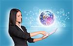 Beautiful businesswomen in suit using digital tablet. Earth with graphs and network. Element of this image furnished by NASA