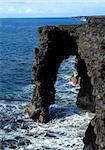 Holei Sea Arch is one among many formed by the rough waves found on the coast of Hawaii Volcanoes National Park on the Big Island.