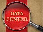 Data Center - Magnifying Glass on Old Paper with Red Vertical Line.