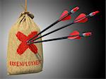 Unemployment - Three Arrows Hit in Red Target on a Hanging Sack on Green Bokeh Background.