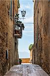 Image of a narrow alley in Pienza, Tuscany, Italy