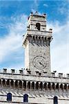Image of town hall Montepulciano Tuscany, Italy with blue sky and white clouds