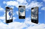 three modern mobile phones on the different cloudy sky