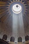 Jerusalem , Israel - July 09 . 2014 :  The Holy Sepulchre Church in the Old City of Jerusalem. Light goes through the dome of the church.