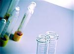 detail of test tubes in hospital laboratory on table with space for text