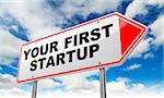 Your First Startup - Inscription on Red Road Sign on Sky Background.