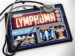 Medical Tablet with the Diagnosis of Lymphoma on the Display and a Black Stethoscope on White Background.